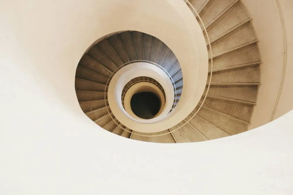 A spiral stair seen from below